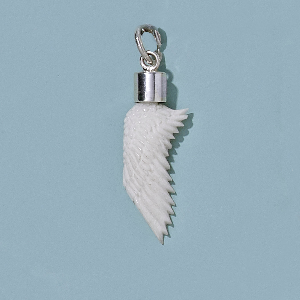 Small Hand Carved Recycled Bone Wing with Silver Cap