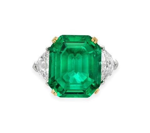 Large octagonal emerald set with two diamonds on the side