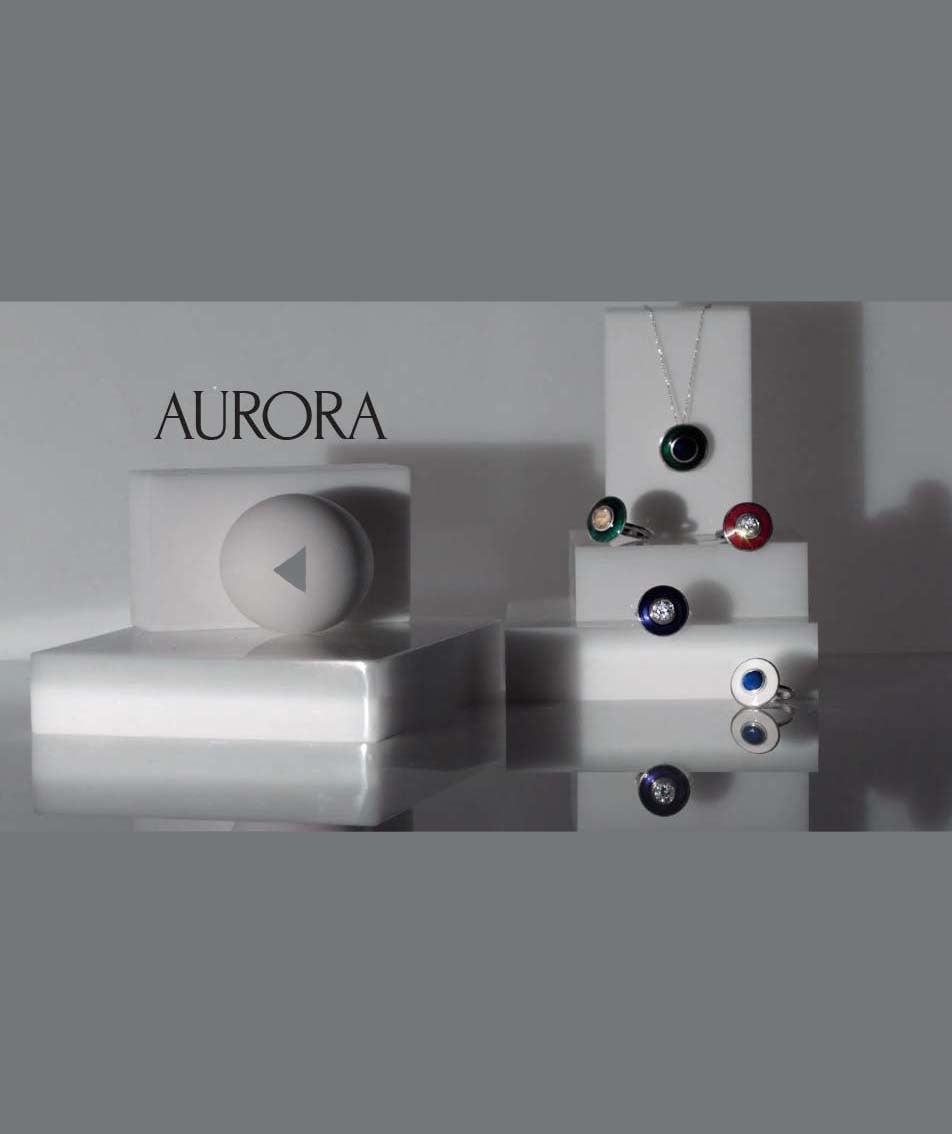 Round and square white blocks with the aurora rings set on them in all their enamel colors
