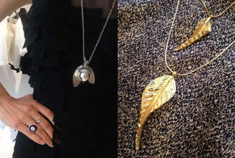 photo of a model wearing silver acorn and helicopter pod and the aurora ring on the left and on the right close up of autumn leaves and vintage silk brown fabric
