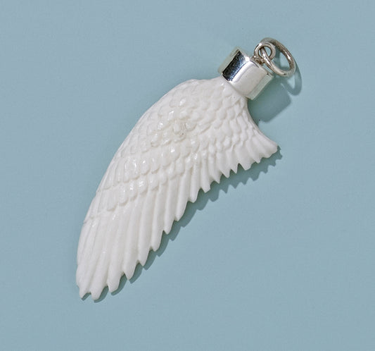Large Hand Carved Recycled Bone Wing with Silver Cap