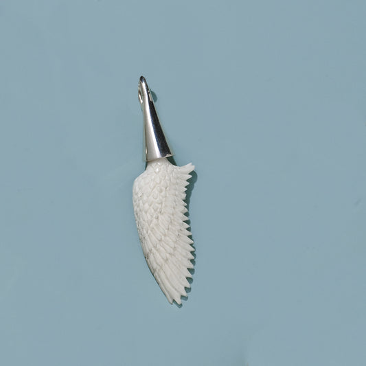 Medium Hand Carved Recycled  Bone Wing with  Cone Silver Cap